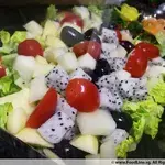 Chef Choice Of Greens With Fresh Fruits And Thousand island Sauce