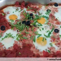 Click to see Shakshuka (V) <i>north african-style baked eggs in tomato sauce</i>