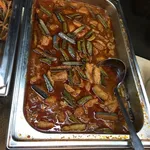 Nyonya Assam Pedas Fish topped with Brinjal, Ladys Finger & Tomato