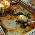 Oven Baked Shakshouka(V)<br> sauteed garlic spinach, romesco sauce, egg, parmesan cheese shred