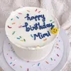 Click to see more photos of Confetti Blanc – Smiley Face Cake