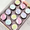 Click to see more photos of Abrielle Dinosaur Mini Cupcakes – Box of 12