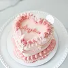Click to see more photos of Angelic – Pink Heart Cake
