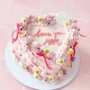 Click to see more photos of Eleanor Ribbon Daisy Cake