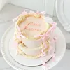 Click to see more photos of Vintage Ribbon Curls Cake