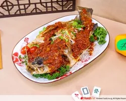 Fried Seabass with Chef Homemade Sauce 招牌香煎金目鲈 | Customer Photo | Delizio Catering Pte Ltd