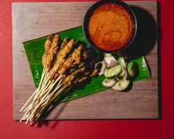 Singapore-Styled Chicken Satay<br>peanut sauce, raw onion, cucumber | Customer Photo | Grain