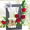 Click to see more photos of BR023: Mini Couple Bear & Red Roses Arrangement