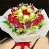 Click to see more photos of RR039: 12 Red Roses With Rochers Hand Bouquet Delivery