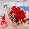 Click to see more photos of RR052: 12 Red Roses Posy With Baby Breath